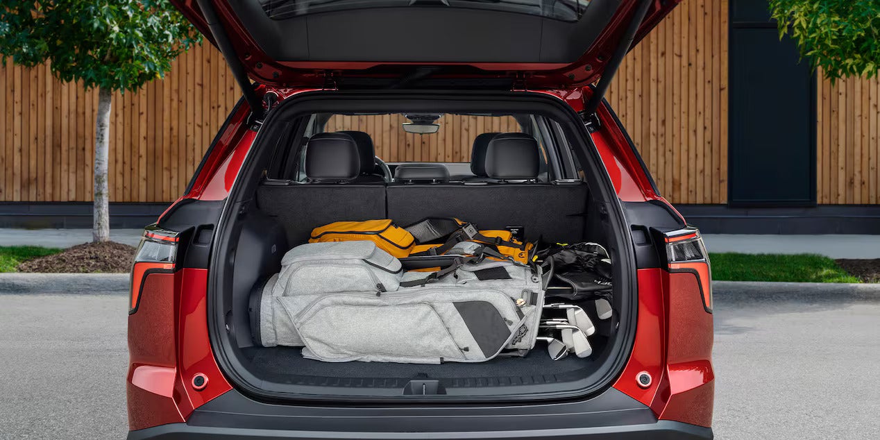 the cargo space of a red suv