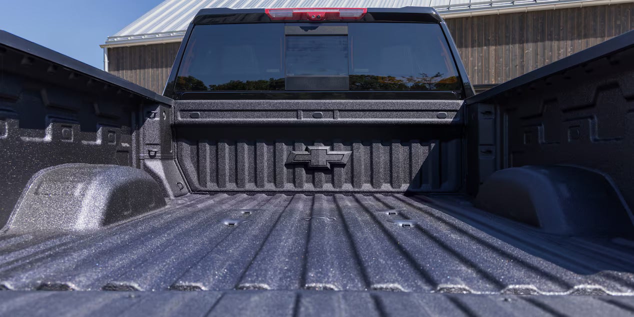 the black bed of a chevy silverado hd