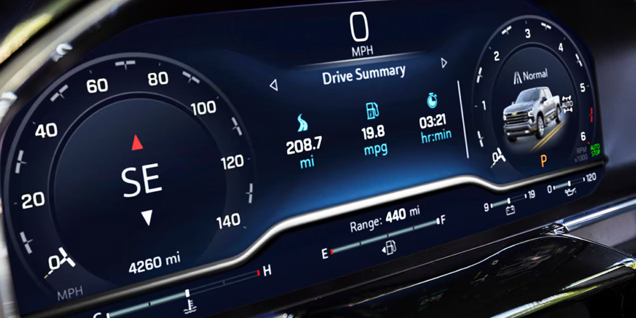 Close-up of the 2025 Chevrolet Silverado’s digital driver information display with driving statistics and fuel efficiency data.