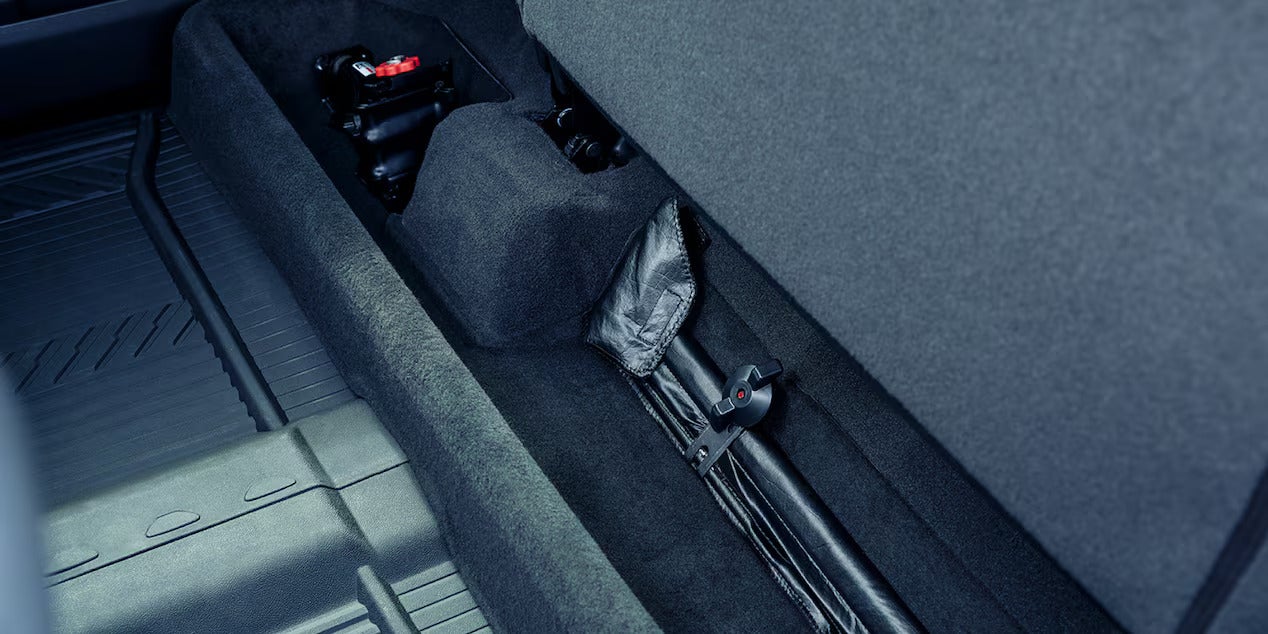 Under-seat storage compartment in the 2025 Chevrolet Silverado, providing additional space for tools and equipment.